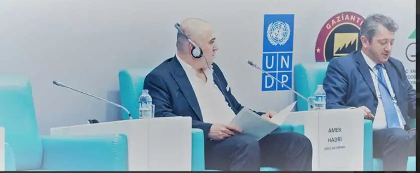 making a statement in front of representatives from the united nations and the turkish government