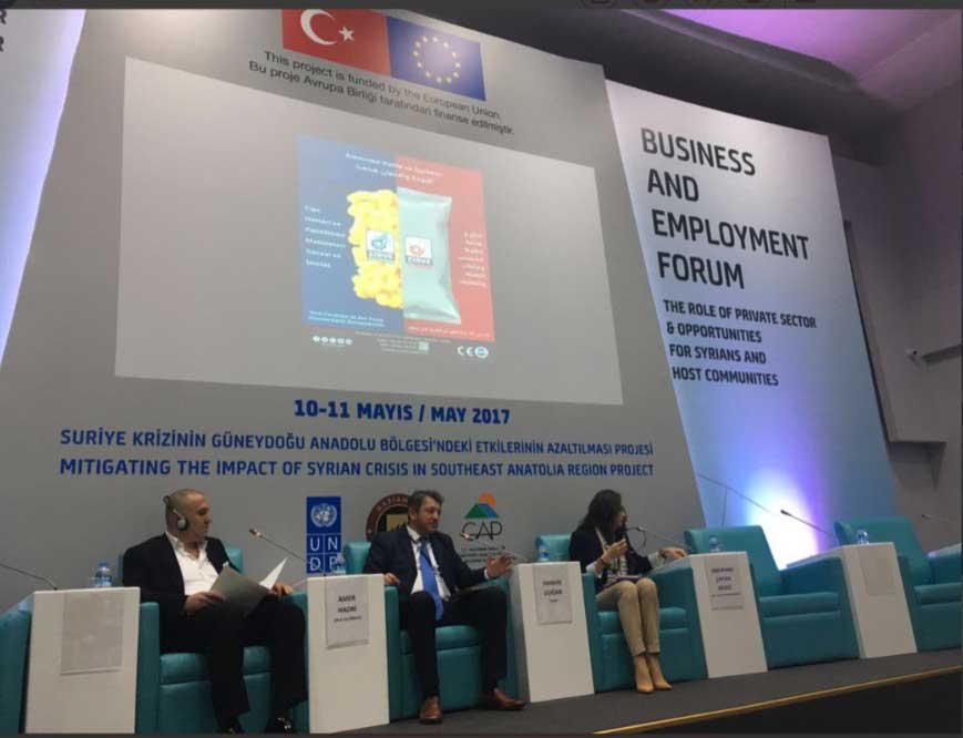 making a statement in front of representatives from the united nations and the turkish government