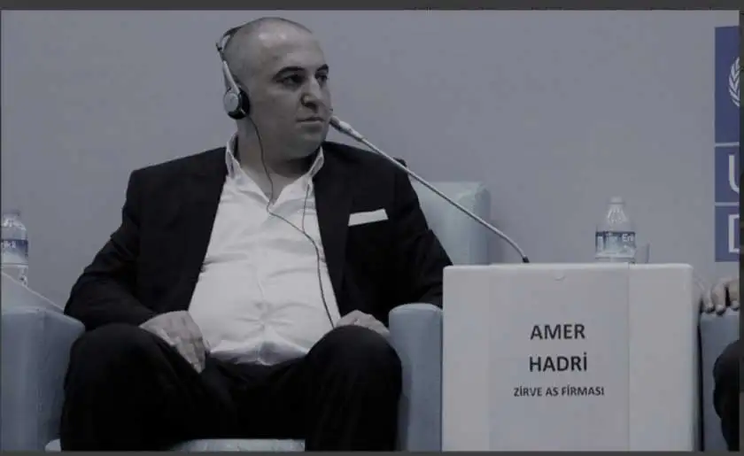 making a statement in front of representatives from the united nations and the turkish government