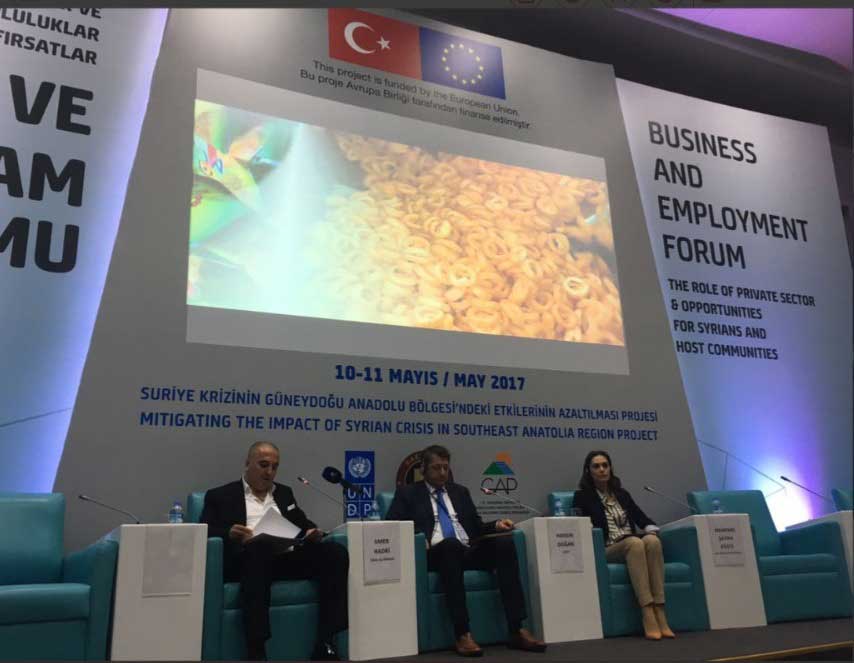 making a statement in front of representatives from the united nations and the turkish government